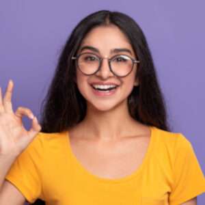 happy-insian-woman-gesturing-ok-sign-and-smiling